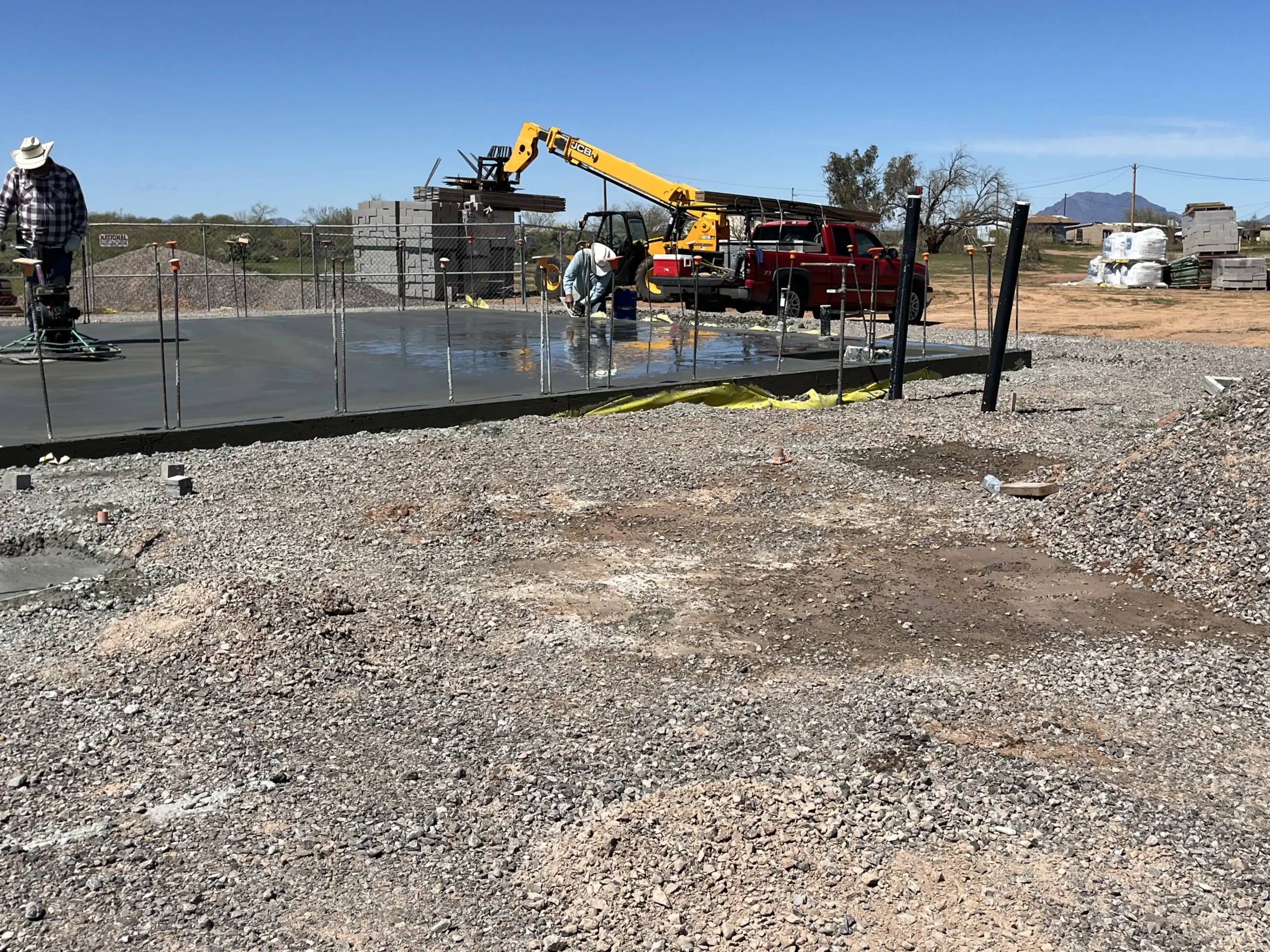 level concrete pouring with tools